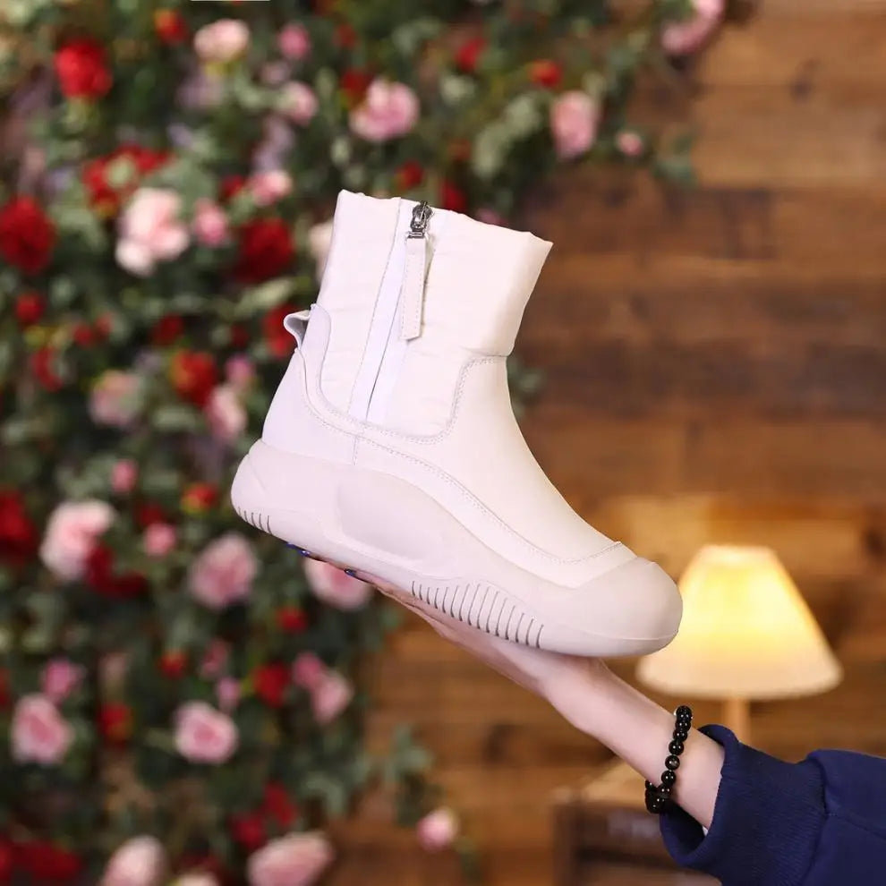 Women's quilted winter ankle boots with plush lining and side zip